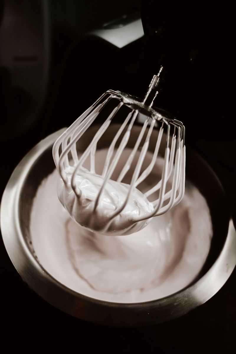 Whisking egg whites to stiff peaks